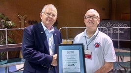 Wendell Glass receiving Certified Director certificate